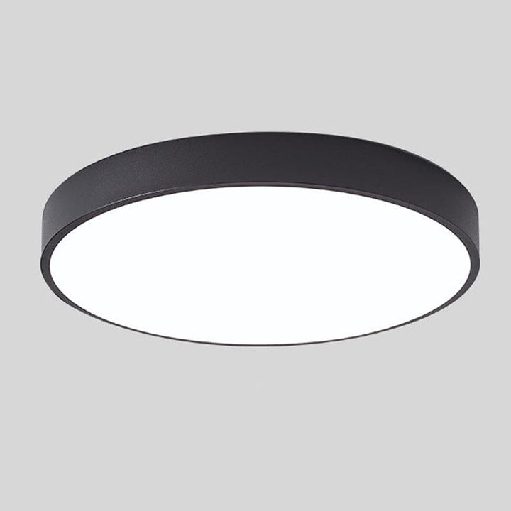 Lámpara de techo LED moderna para dormitorio, luz ambiente circular con diseño minimalista.