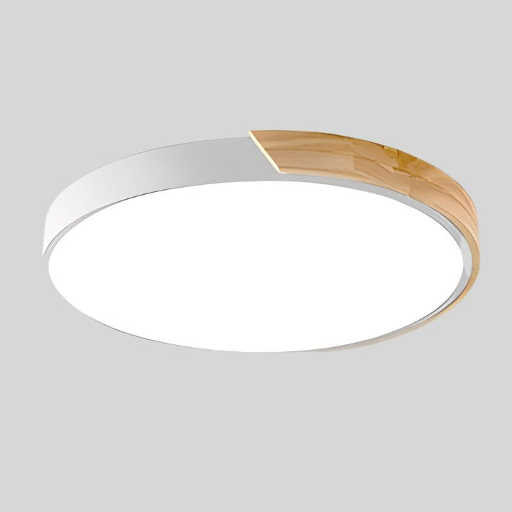 Lámpara de techo LED circular con colores ajustables, ideal para decoración moderna y versátil.