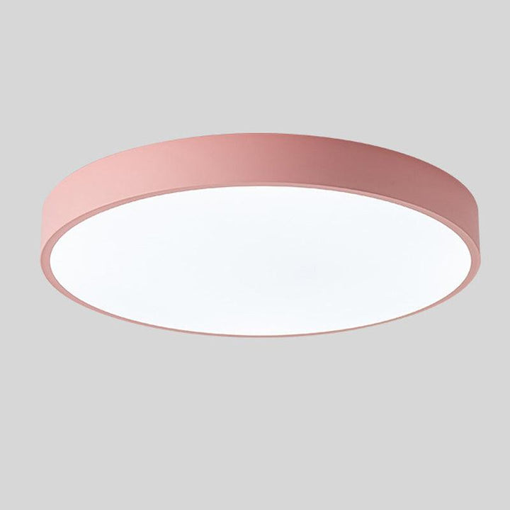 Lámpara de techo LED circular minimalista, luz empotrada con diseño escandinavo funcional.