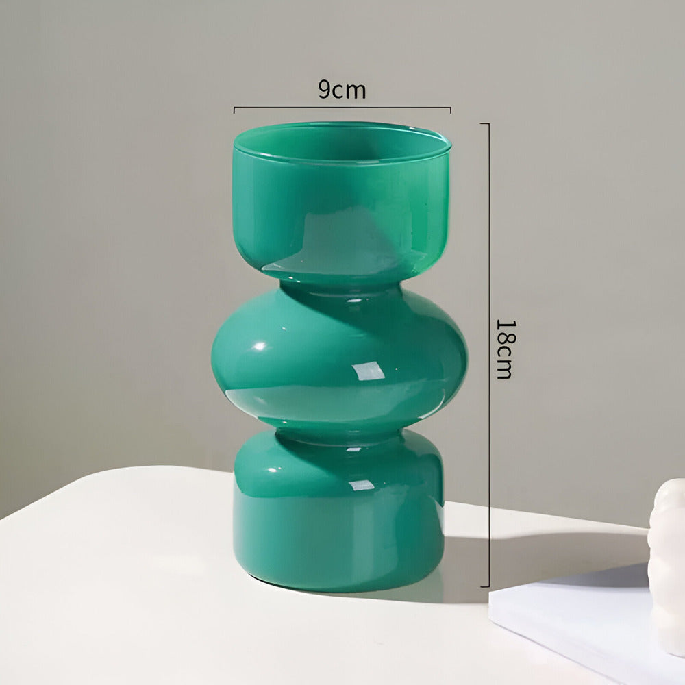 Jarrón decorativo minimalista, con burbujas apiladas, diseño contemporáneo para un florero moderno en tu hogar.