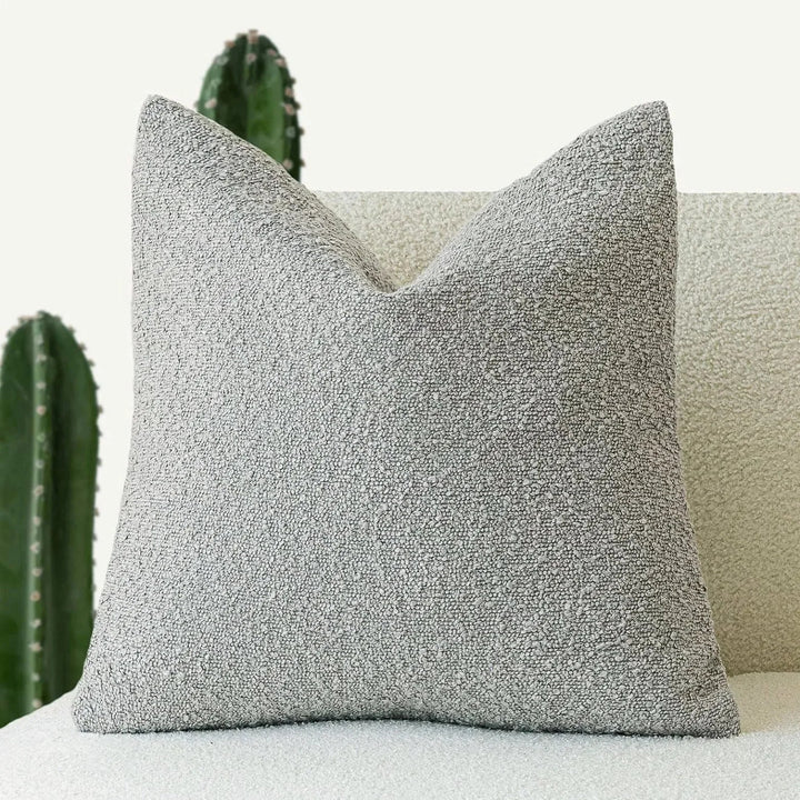Funda cojín decorativa, tela boucle, 45x45cm. Estilo moderno, hogar elegante, textura acogedora.