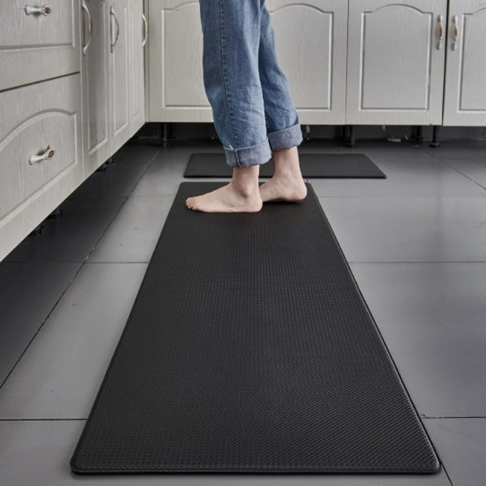 Tapete de cocina impermeable de PVC, fácil limpieza. Superficie antifatiga para confort diario en cualquier cocina.