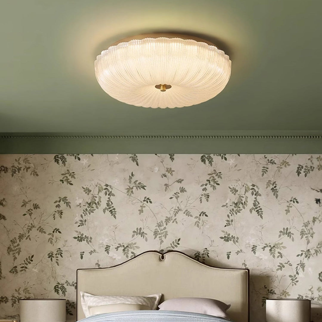 Plafón LED con distintivo vidrio ondulado, provee iluminación interior ajustable para todo tipo de ambiente.