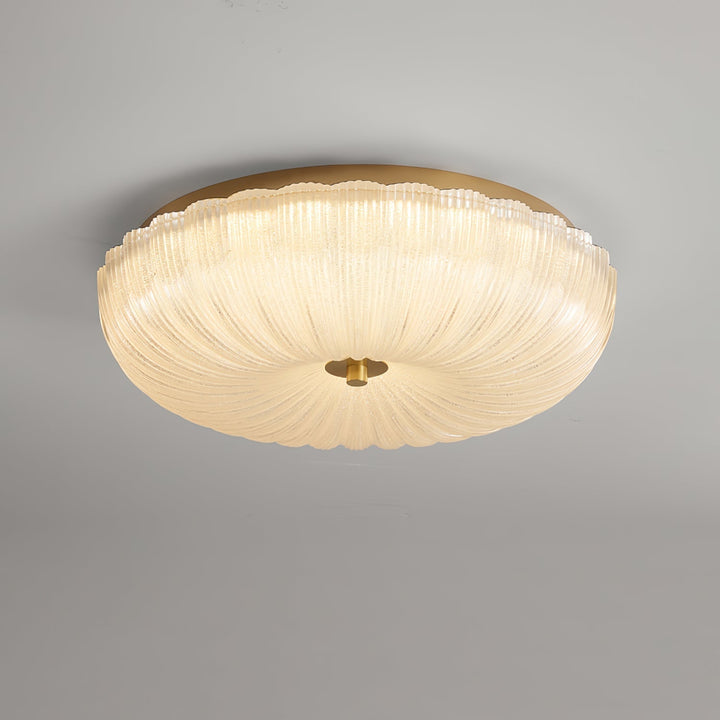Lámpara de techo LED redonda, vidrio ondulado, con opciones de luz cálida y fría, eficiencia y diseño.