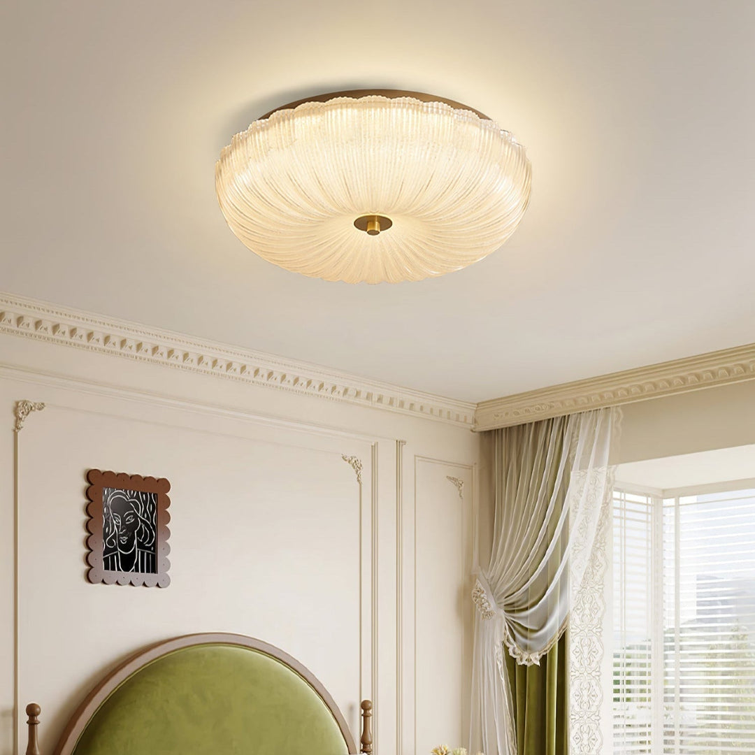 Lámpara de techo LED redonda, con vidrio ondulado, perfecta para una iluminación moderna y adaptable.