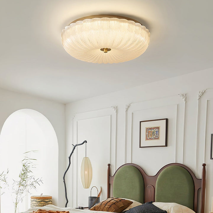 Plafón LED con vidrio ondulado, ofrece luz cálida/fría y alta eficiencia energética. Ideal para decoración.