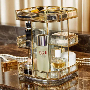 Almacenamiento de lujo: organizador giratorio de vidrio dorado para tocador, ideal para maquillaje y joyería.