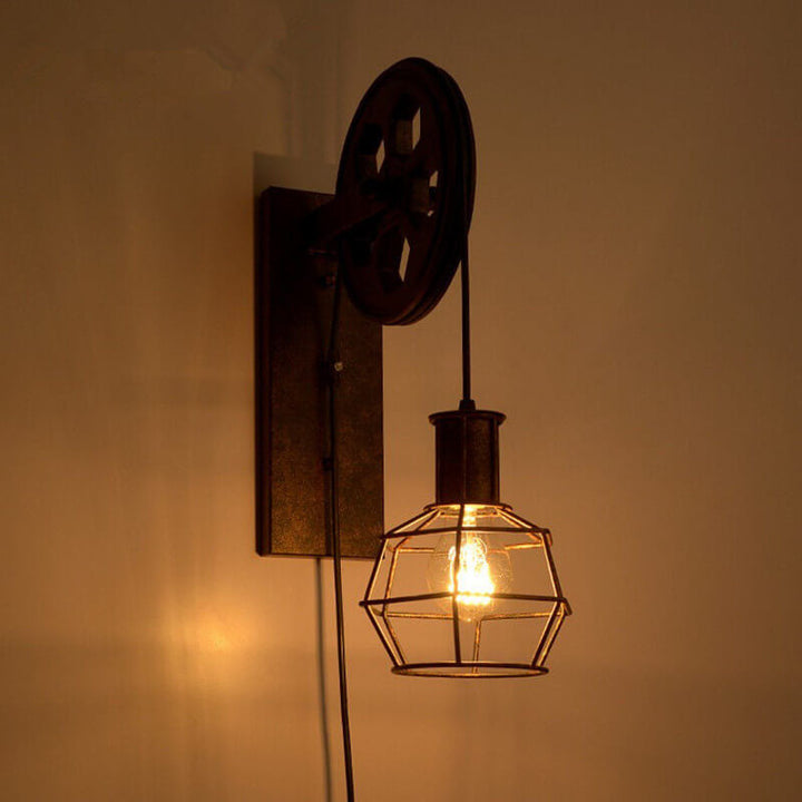 Luminaria de pared estilo industrial con acabado rústico, hierro y polea E27, aplique moderno.