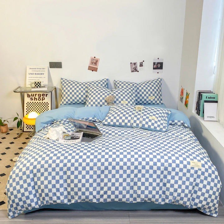 Textil hogar: funda nórdica de ajedrez blanco y negro, aportando un toque moderno y elegante a tu dormitorio.