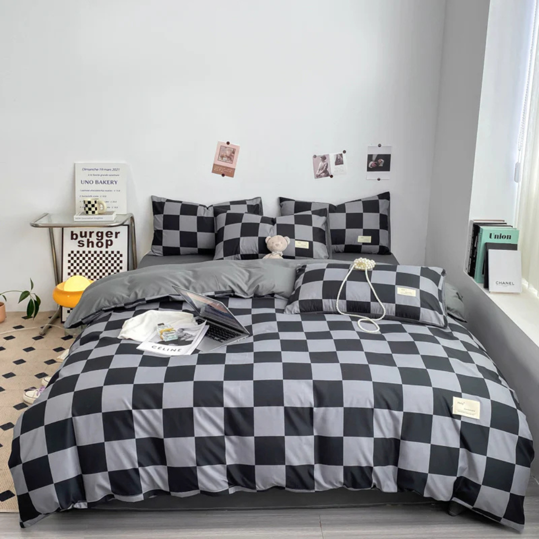 Funda de edredón estilo ajedrez para un dormitorio con diseño moderno. Ropa de cama geométrica contemporánea.