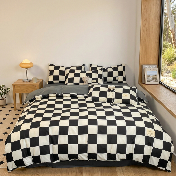 Funda nórdica moderna con diseño de tablero de ajedrez en blanco y negro, ideal para dormitorio contemporáneo.