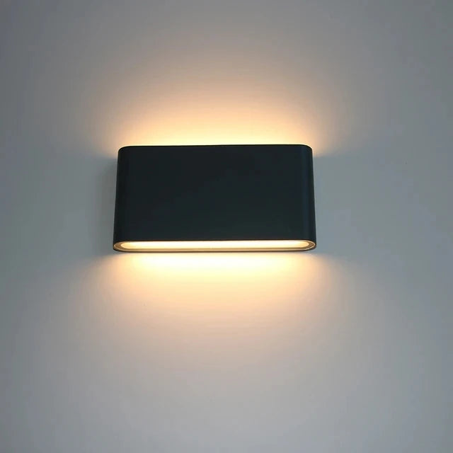Iluminación bidireccional LED exterior, aplique de pared minimalista impermeable para fachadas y decoración.