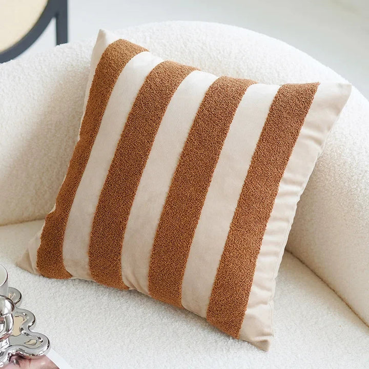 Funda cojín geométrica tufted para salón, decoración moderna y acogedora.