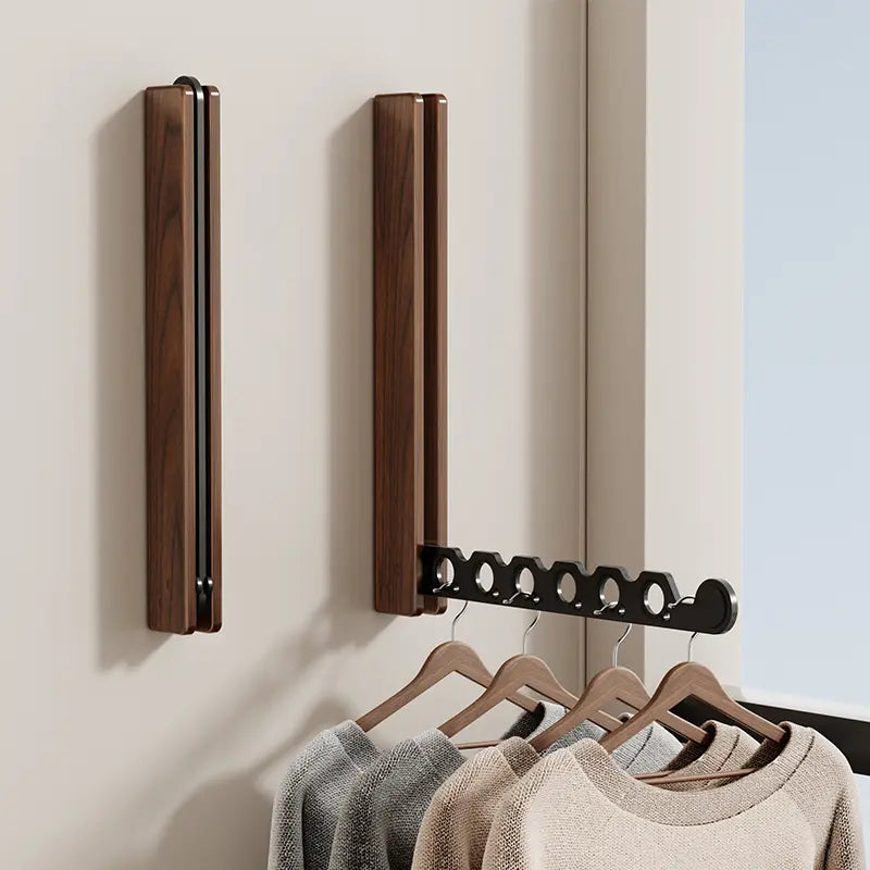 Perchero colgador de pared minimalista para dormitorio, ideal para ropa y accesorios.