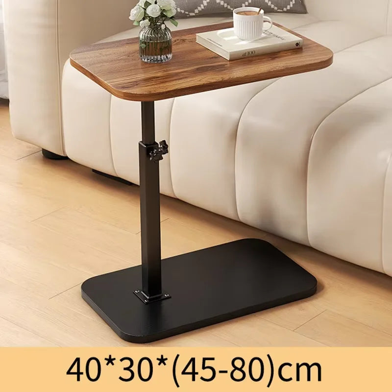 Mesa portátil de diseño C, moderna y ajustable para trabajar o leer cómodamente desde el sofá.