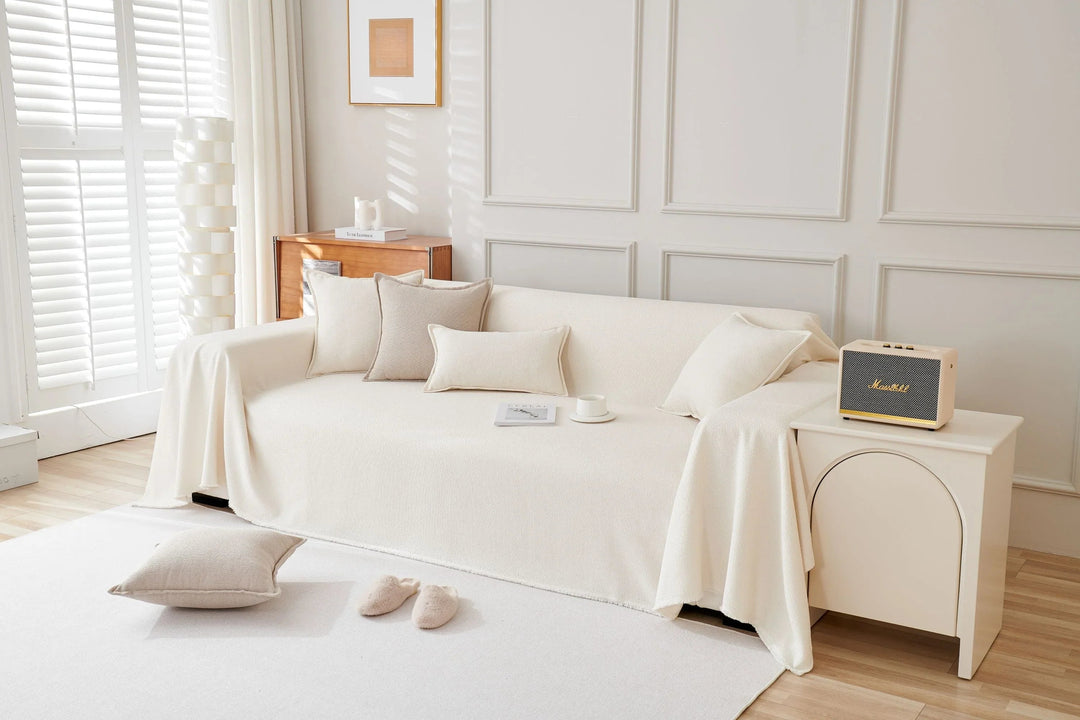 Textil decorativo blanco roto para el hogar, manta plaid multifuncional para proteger y embellecer tu sofá.