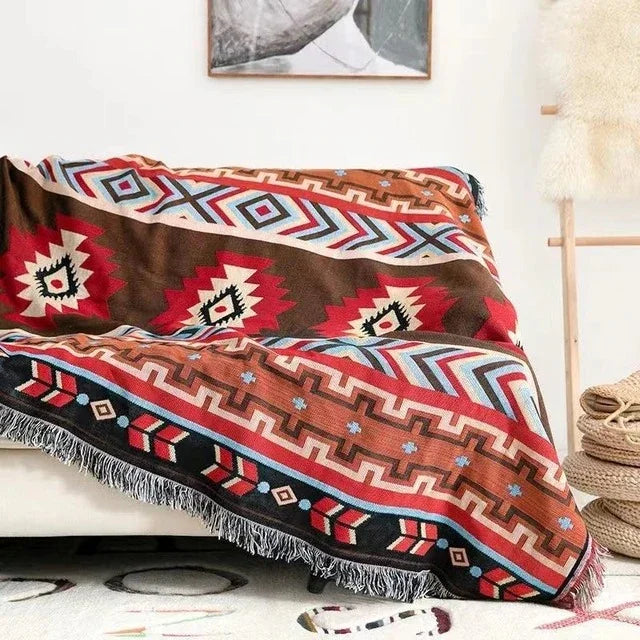 Manta decorativa estilo jacquard, suave poliéster y algodón para un hogar con confort.