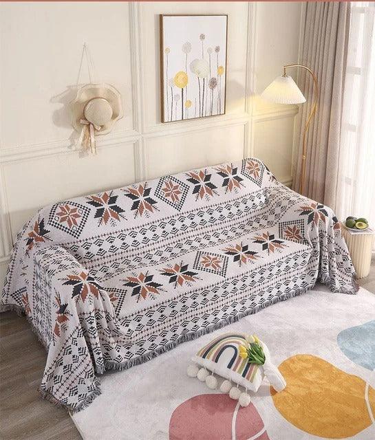 Manta de lujo suave, mezcla de poliéster y algodón jacquard para confort en sofá y cama.