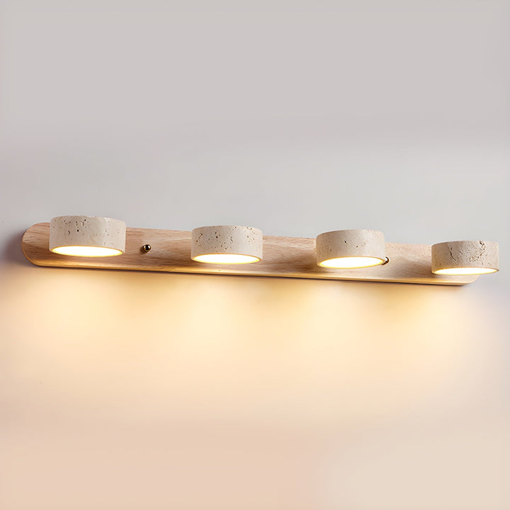 Aplique de travertino y nogal con luz doble, realza la piedra natural en tu decoración.
