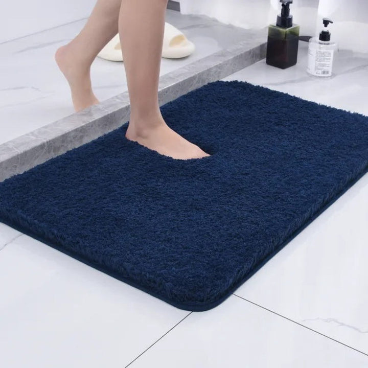 Alfombra de baño absorbente antideslizante de microfibra, piel sintética y tacto suave para seguridad.