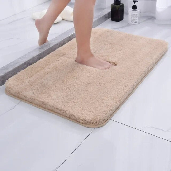 Alfombra de baño de microfibra y piel sintética para confort, antideslizante y lavable a máquina.