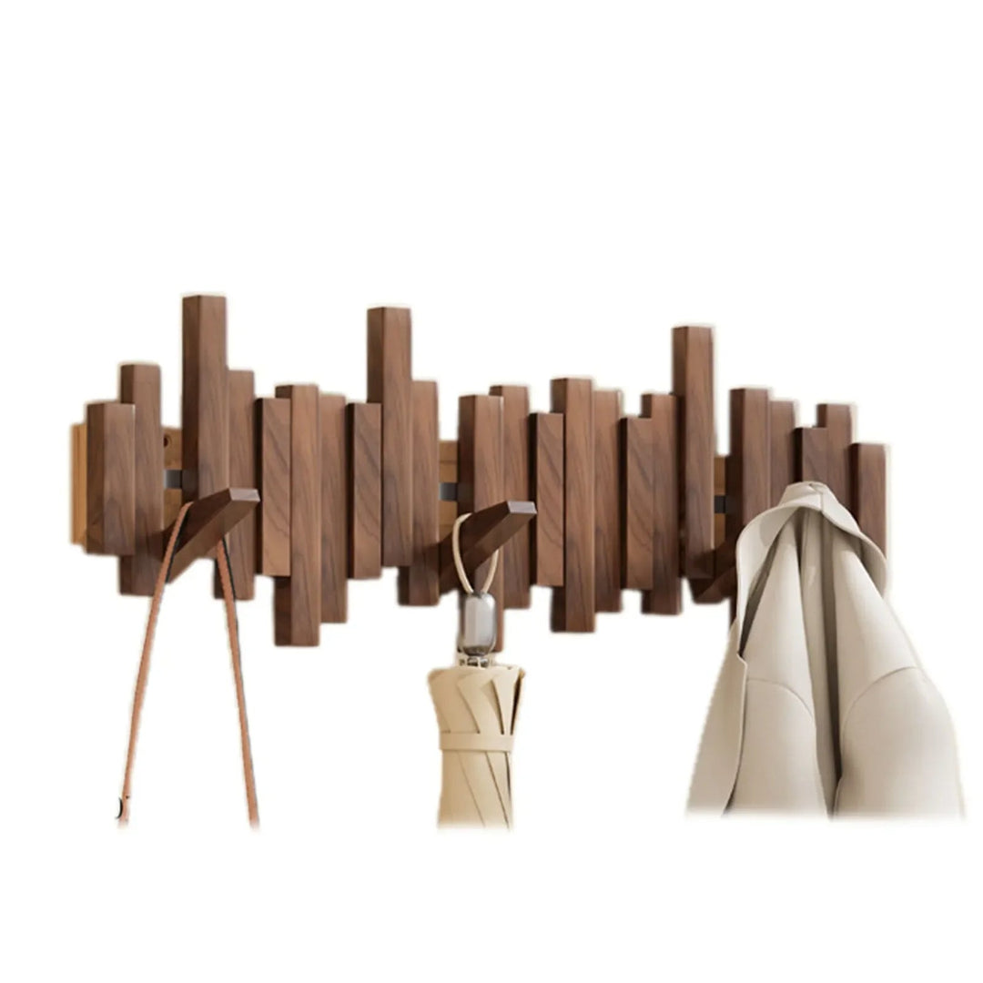 Ganchos plegables magnéticos para pared. Diseño moderno y minimalista para ahorrar espacio en el hogar.