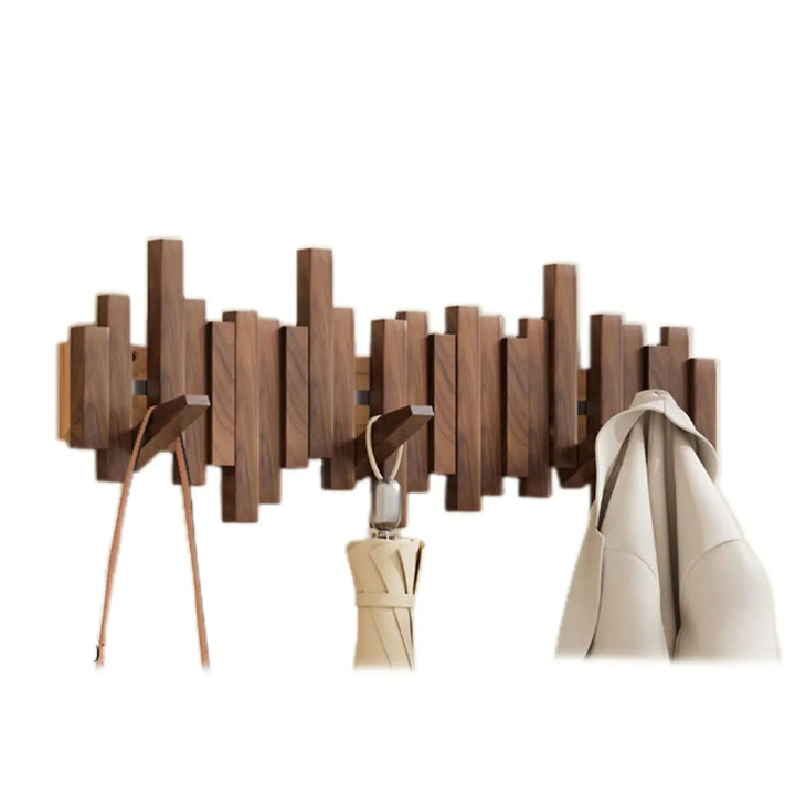 Ganchos plegables magnéticos para pared. Diseño moderno y minimalista para ahorrar espacio en el hogar.