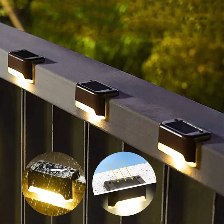 Luces solares LED decorativas para cercas y barandillas. Iluminación cálida exterior.