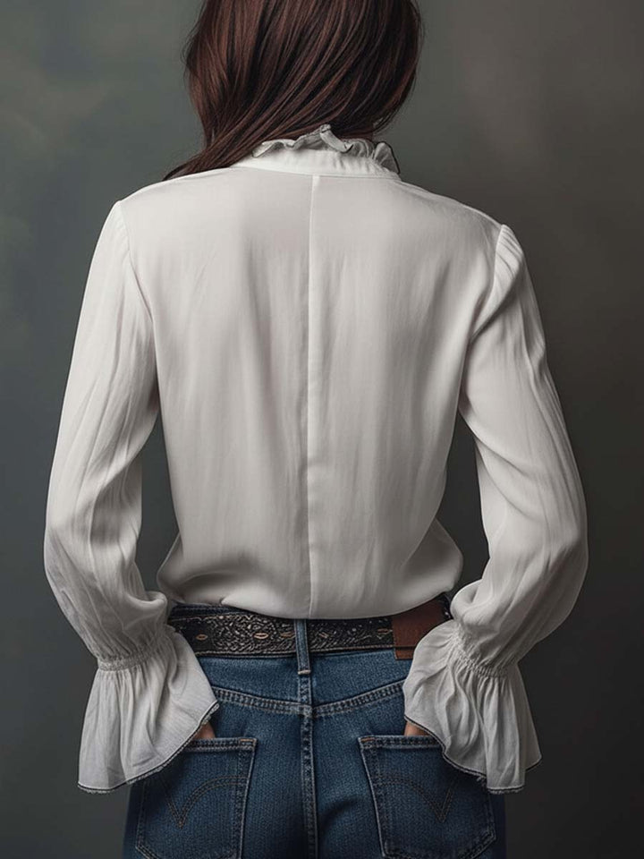 Blusa de moda mujer manga larga, cuello camisero con cremallera. Perfecta para un estilo diario elegante.