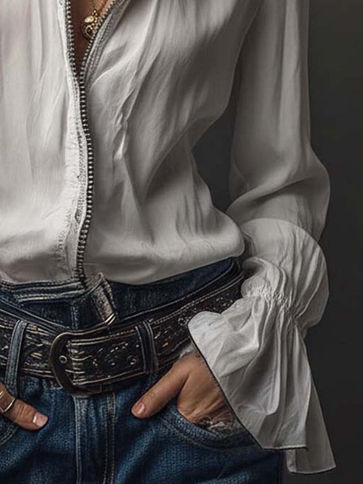 Blusa camisera de mujer manga larga con cremallera, casual y elegante para look de primavera.
