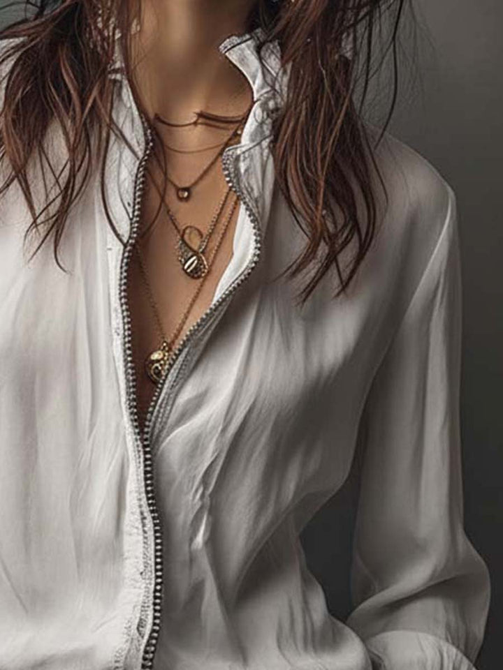 Top blusa de mujer manga larga, cuello camisero y cremallera, estilo versátil para primavera.