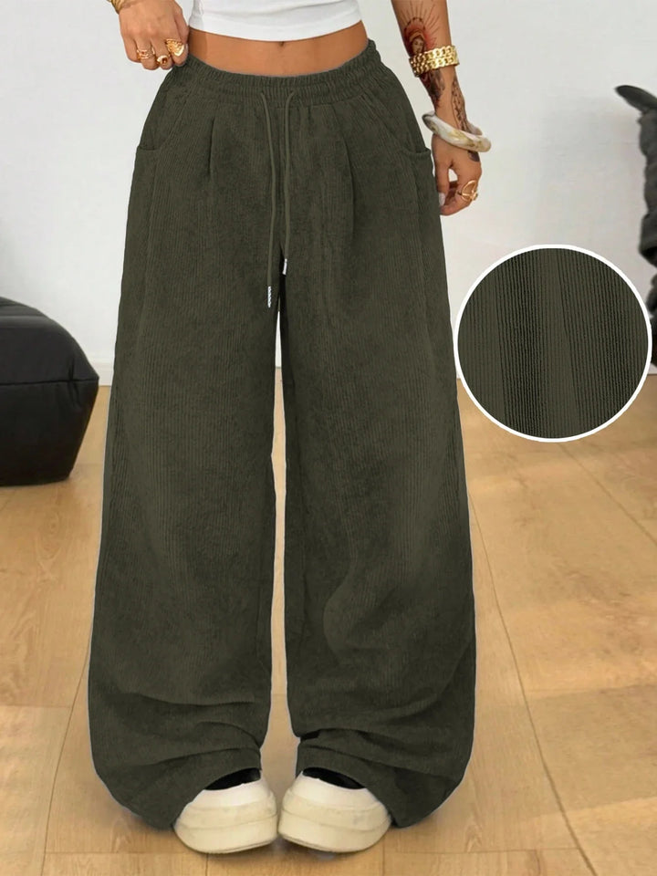 Pantalones anchos de pana para mujer, estilo moderno y casual, con cordón para mayor confort.