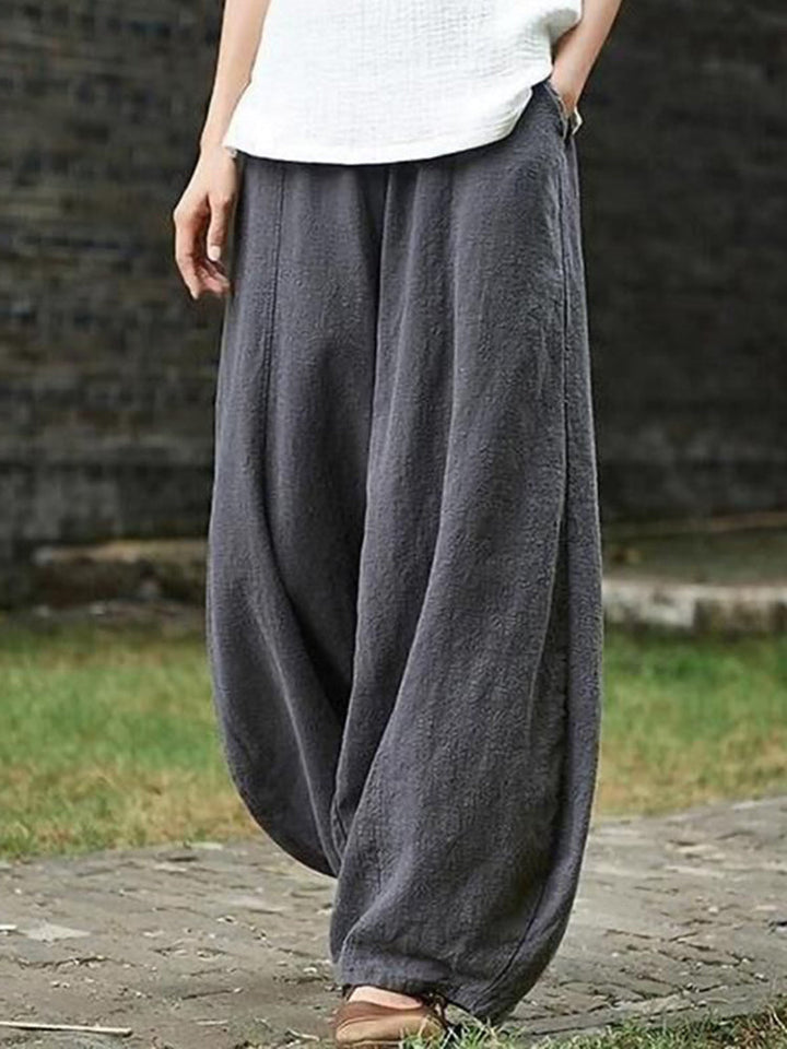 Pantalón casual de algodón para mujer con cintura elástica, perfecto para verano.