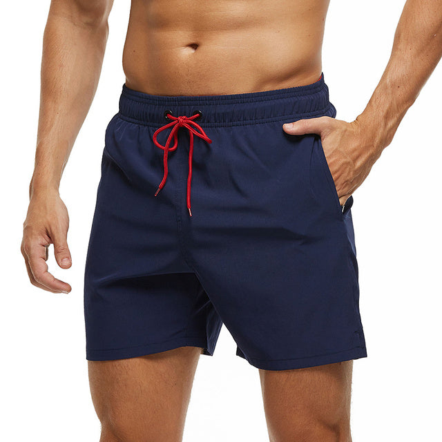 Pantalones cortos casuales de hombre, con cordón y cintura elástica, ideales para verano. Perfectos para playa, deporte u ocio.