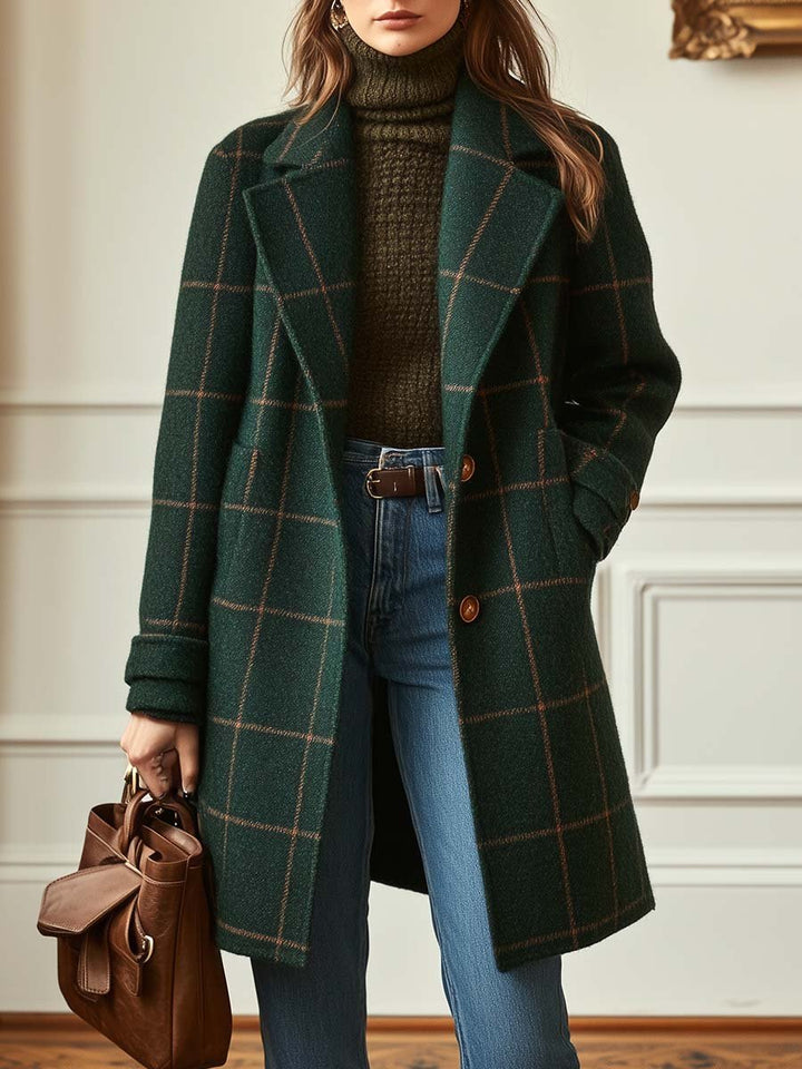Chaqueta larga de entretiempo para mujer, con estampado de cuadros verde oscuro. Combinable y muy de moda.