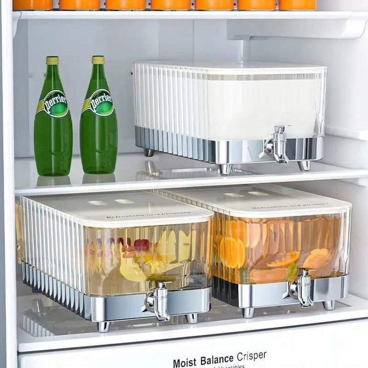 Dispensador de bebidas de vidrio portátil para fiestas y reuniones. Ideal para mantener jugos, cócteles o agua fría en casa.