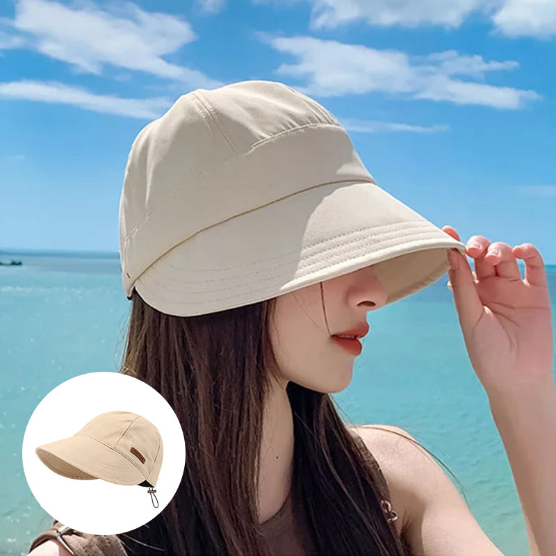 Sombrero de playa UV beige para mujer, accesorio esencial para el verano y viajes.