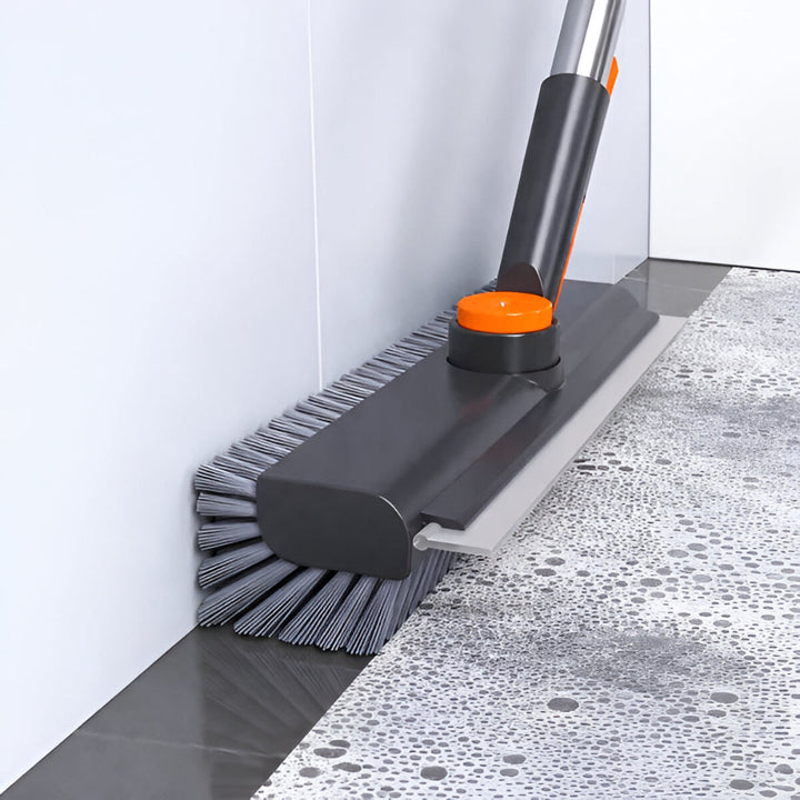 Cepillo limpiador de pisos resistente con mango largo y cerdas rígidas para limpieza profunda de hogar, baldosas y patios.