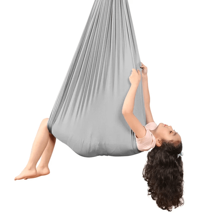 Columpio sensorial para niños con TDAH, excelente para enfocar la energía y desarrollar habilidades.