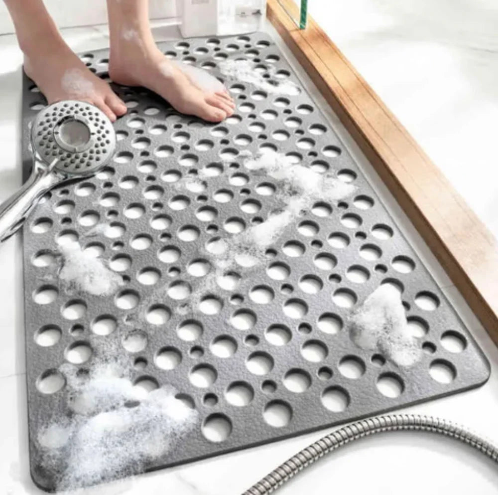 Alfombra antideslizante para ducha, disponible en formas cuadrada o rectangular, máxima seguridad para tu baño.