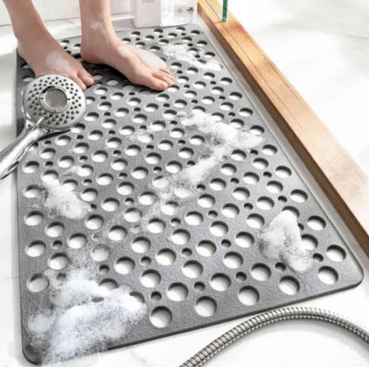 Alfombra antideslizante para ducha, disponible en formas cuadrada o rectangular, máxima seguridad para tu baño.