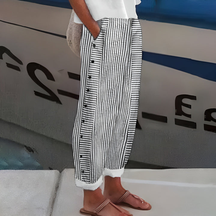 Pantalón rayado mujer de corte relajado, perfecto para un look casual de verano.