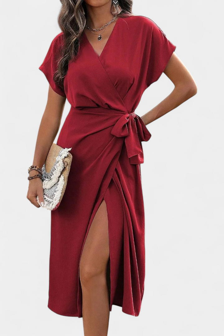 Vestido cruzado fluido para mujer, estilo midi, escote V y abertura lateral. Ideal para fiestas de día.