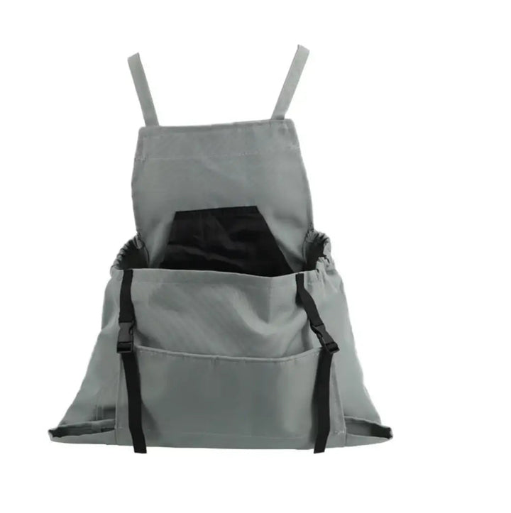 Delantal de trabajo resistente para jardinería. Diseño unisex, tirantes cruzados para confort y organización con bolsillos.