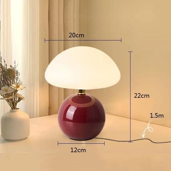 Iluminación de diseño, lámpara de mesa tipo hongo, estilo vintage que evoca la estética Bauhaus.