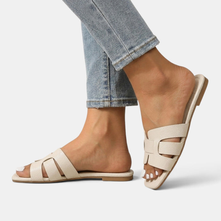 Sandalias ortopédicas planas mujer en H, disponibles en varios colores, ideales para combinar con tu estilo veraniego.