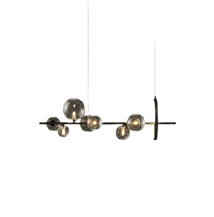 Elegante lámpara de araña con esferas de cristal, diseño ajustable para cualquier estilo.