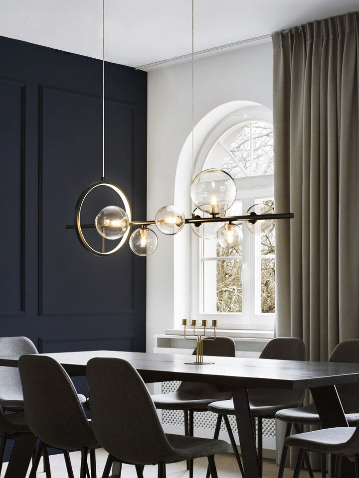 Sofisticada lámpara colgante, araña moderna con esferas de cristal para un toque elegante.
