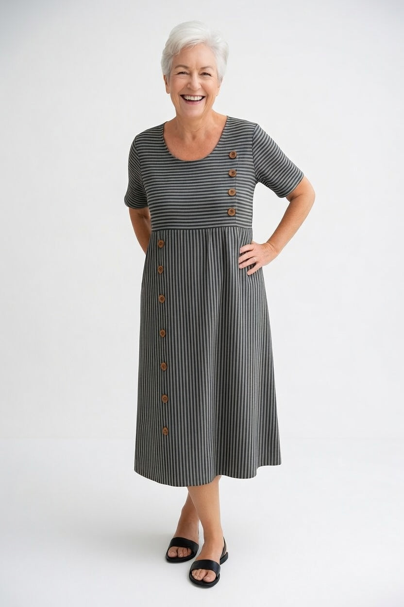 Vestido midi fluido de rayas, perfecto para mujer. Un diseño veraniego casual y cómodo.