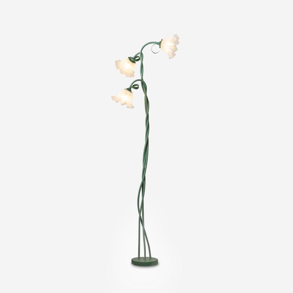 Lámpara de pie floral, pantalla con motivos verdes. Iluminación de diseño para salón.